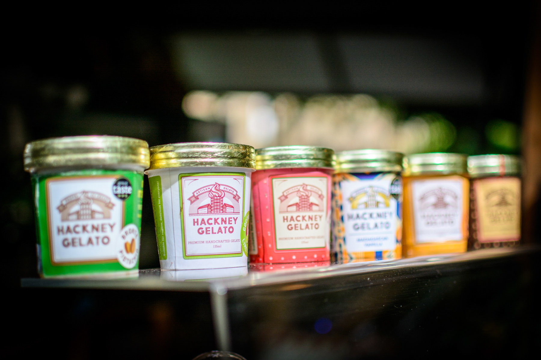 An image showing tubs of Hackney Gelato ice cream lined up on display.